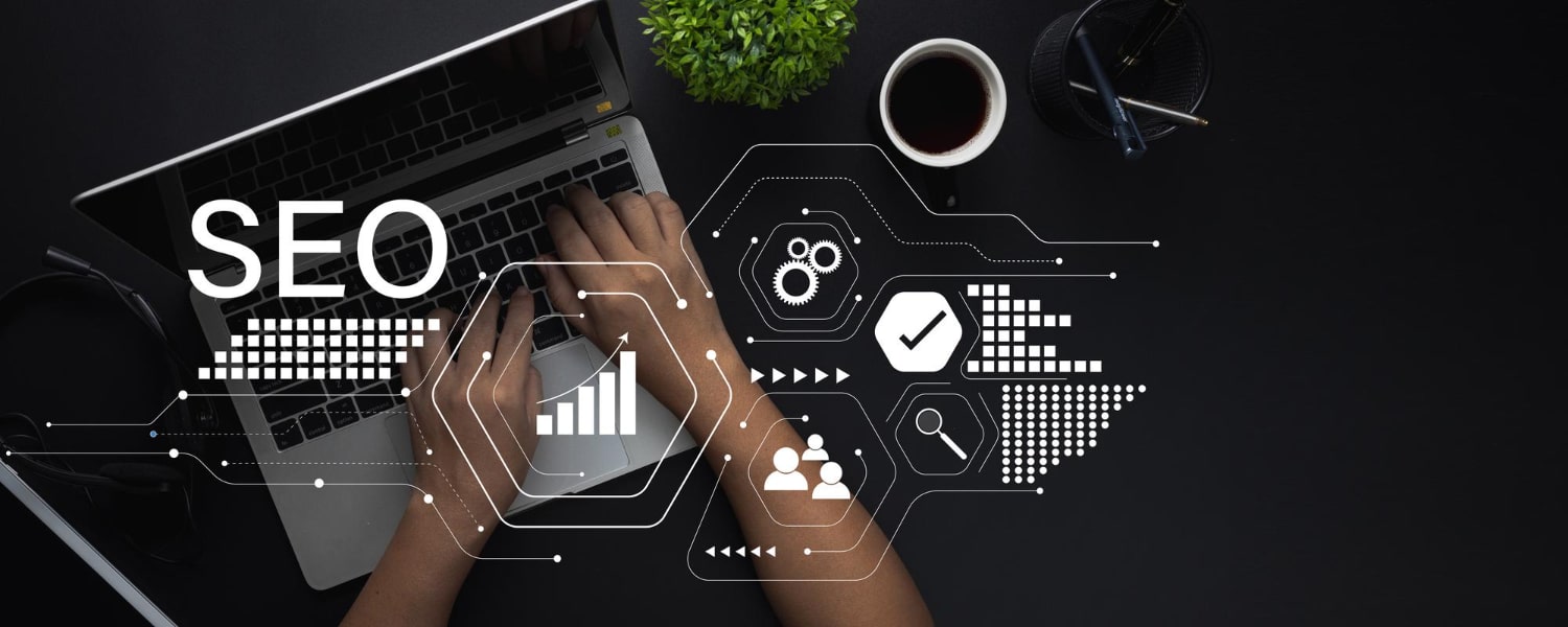 Small business SEO services concept showing hands on a laptop with SEO icons, analytics graphs, and search optimization symbols.